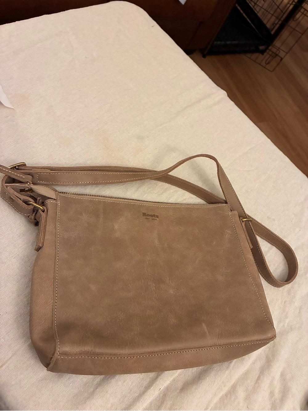 Roots Riverside Saddle Tribe Purse